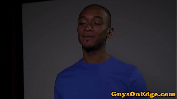 Bound black gay gets a handjob until cumshot