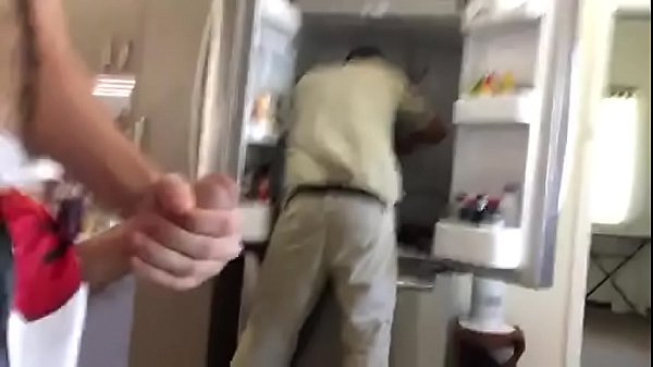 Wank behind fridge repair man