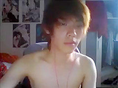 Chinese guy wanks some cum