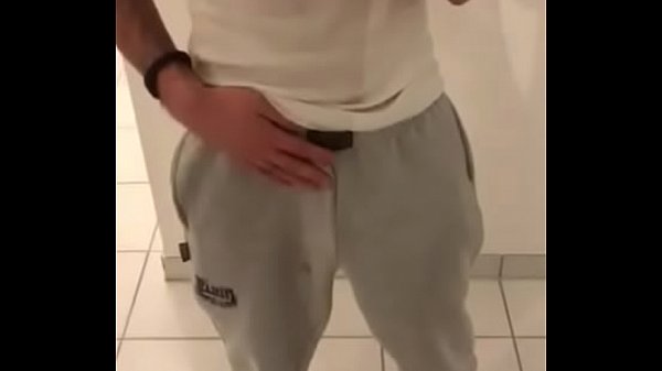 Latin boy stripping and playing with cock in bathroom