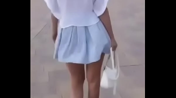 Asian babe looses skirt